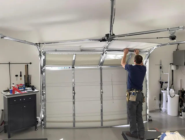 Newport Beach Garage Door Repair specialist performing precise section replacement on Newport Beach garage door